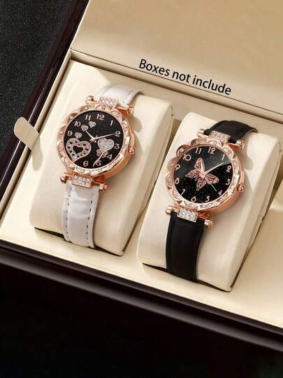 这款女士手表套装包含两件。表带采用皮革材质，并饰有心形和蝴蝶图案。适合日常佩戴，也是送给女性朋友的绝佳礼物。