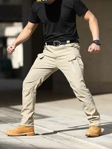 Pantalones tácticos multibolsillos para hombre están hechos de tela duradera y resistente al agua y cuentan con bolsillos laterales y cremalleras. - Caqui - Ver 2