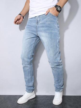 Jeans slim de pierna recta con lavado medio azul y desgaste de bigote de gato para adolescentes
