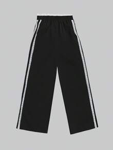 Pantalón de mujer unicolor cómodo para uso casual con rayas laterales de encaje - Negro - Ver 5