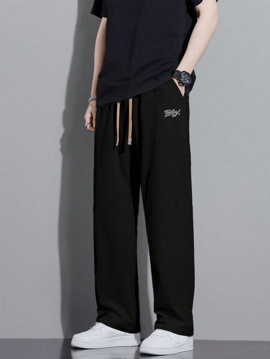 Men's Relaxed Fit Drawstring Waist Slant Pockets Solid Color Casual Pants, Fall - Black - View 1