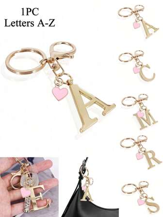 1pc High-End Elegant Gold Letter Keychain, Letter A-Z Three-Dimensional Pendant, With Pink Heart Pendant, Fashionable Alloy Keychain Ring, Backpack Charm Car Keychain, Perfect Accessory For Women's Daily Use, Couple Gift, Classic And Simple Keychain, Decoration, Bag Accessories, Suitable For Giving To Friends, Family, Lovers, Girlfriends, Important Gifts, Holiday Souvenirs