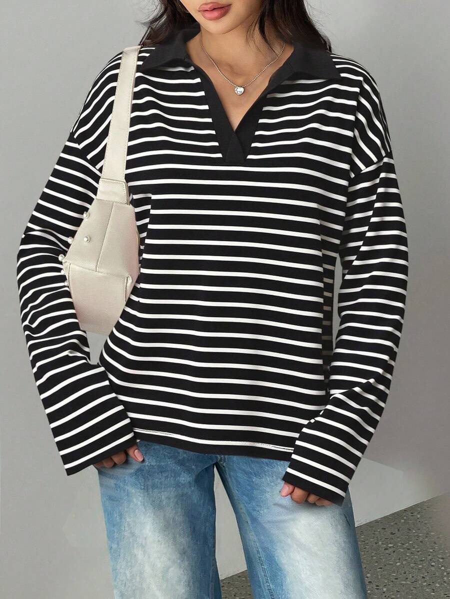 Áo sơ mi dài tay cổ bẻ kẻ sọc đen trắng cổ điển, thoải mái và dễ phối đồ. - Đen và trắng - Xem 1