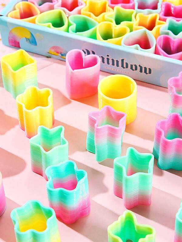 Set de juguetes de resorte de primavera arcoíris - Mini juguetes de resorte de plástico con formas | Anillos apilables de resorte mágico, colores y formas brillantes, rellenos de bolsas de regalo, premios de fiesta y rellenos de calcetines navideños, perfectos para actividades de fiesta de Halloween, juguetes antiestrés