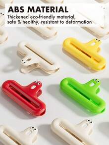 1 pieza Clip sellador de bolsas de comida, sellador de bolsas de aperitivos de dibujos animados lindo, hecho de ABS duradero, abertura grande que se ajusta a diferentes tamaños de bolsas de aperitivos, mandíbula con clip de acero inoxidable dentado, fuerza de sellado fuerte, a prueba de humedad, diseño con orificio colgante para almacenamiento ahorrando espacio, disponible en blanco, rojo, amarillo, verde