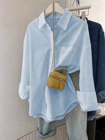 女式休闲蓝色长袖口袋衬衫