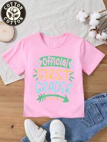 Kids' Cotton T - Shirt: 'Official FIRST GRADER' Graphic – Perfect For 1st Grade Students To Show Their Grade Identity - Pink - View 1