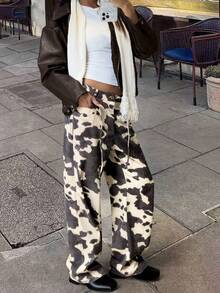 休闲复古牛皮印花裤