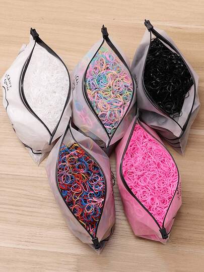 1000件女士美发工具套装！这款惊艳的美发刷内置编织器和一套方便的橡皮筋。双面锯齿梳能有效梳理凌乱的长发，即使在淋浴后在浴室里也能展现迷人魅力。