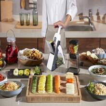 Affettatrice e sminuzzatrice manuale 9 in 1 con spessore regolabile, lama in acciaio inossidabile 304 - Utensile da cucina multifunzionale per fette di patate, grattugiatura di formaggio, cubettatura di pomodori - Lavabile in lavastoviglie e design portatile, preparazione dei pasti, facile da usare, materiale di alta qualità, affettatrice per verdure multifunzionale per chef professionisti - Affettatrice sicura aggiornata con impostazioni regolabili, lama in acciaio inossidabile rimovibile e grande capacità per patatine fritte