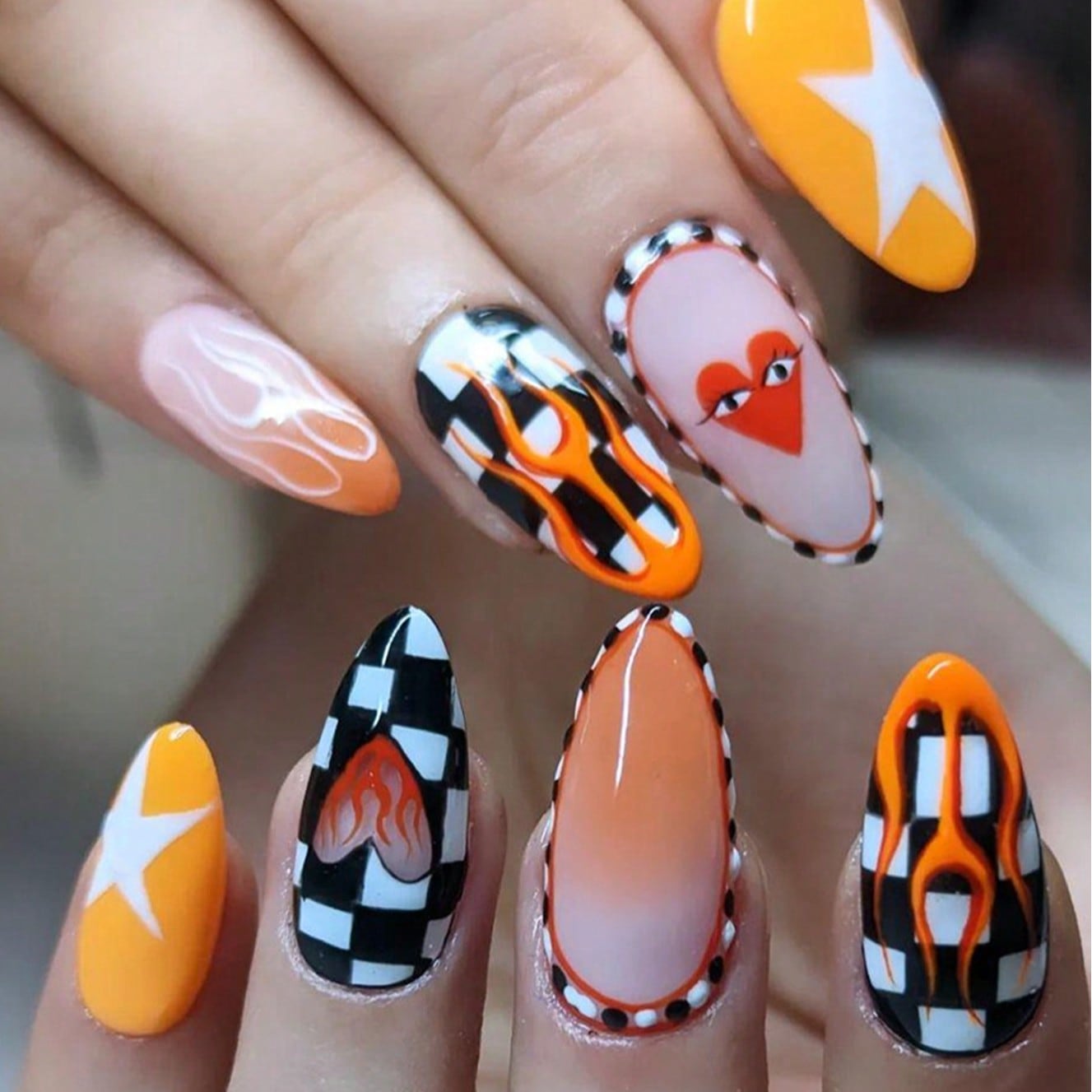 24pcs Almond Shaped Faux Rivet Nail Stickers, Sweet & Fresh Girly Style Multi-Color Flame Pattern, Heart Grid Design, Heart Eyes Design, With Glossy Effect. Heart-Shaped Nail Art, Valentine's Day Nail Art, Apply With Gel Polish, Comes With 1 Nail File. Suitable For Women's Daily Wear, Applicable For Shopping, Dates, Work Or Parties. Nails Nail Supplies