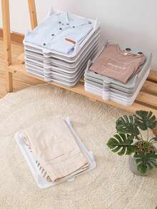 1 件装多功能折叠衣橱板，是节省空间、轻松日常整理的百搭衣橱伴侣；坚固轻巧的设计可整理衣物，折叠后平整，让服装保持整洁，适合日常穿着、旅行、洗衣和换季准备；是春季大扫除、宿舍、单身公寓、衣橱改造、送给妈妈的礼物、新娘准备和首次置业的理想之选；提升衣物的可见性、易取性和更流畅的搭配流程。 - 白色 - 查看 5