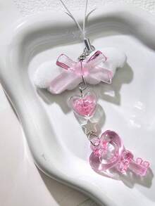 1 st. rosa ostnyckelring DIY-dekoration med fjärilsvinge, hjärta, stjärna, telefonrem, anteckningsbokhänge