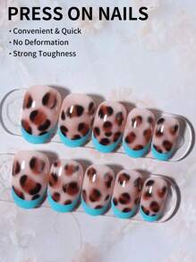 24 件短椭圆形豹纹指甲设计蓝色法式亚克力按压指甲短杏仁完美贴合假指甲套装，包括：1 件果冻胶和 1 件指甲锉，易于佩戴的法式尖头按压指甲艺术，适合女性和女孩日常生活狂欢派对使用指甲用品指甲 - 彩色 - 查看 3