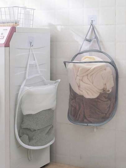 1个可折叠壁挂式脏衣篮，适用于浴室或卧室等小空间收纳，悬挂式脏衣篮，带可拆卸垃圾袋，透气内衬，防水面料，防锈五金件，超轻耐用，安装简便，是紧凑型衣柜和宿舍的理想解决方案，方便快速分类和隐藏式存放衣物，是忙碌早晨和保持家居整洁的理想之选。
