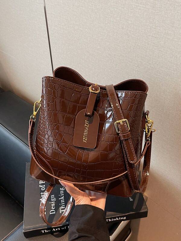 Nouveau sac seau mode de niche, en cuir verni PU avec motif crocodile, polyvalent et décontracté. Sac à bandoulière/porté travers rétro et classique de haute qualité avec large bandoulière. Convient pour le travail, les sorties, les courses, l'usage quotidien