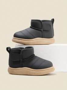 Schwarze Ankle Boots für Jungen und Mädchen im Alter von 3 bis 12 Jahren im Jahr 2025, komplett umhüllt mit Kunstleder-Obermaterial, wärmeisolierender Plüschfutter, rutschfest und abriebfest, Slip-On Ankle Boots, flach und cool im Grundstil, Kinder Winterstiefel, essentiell für Schule, Winterausflüge und Weihnachtsoutfits!