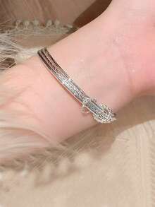 Bransoletka z wisiorkiem w kształcie liścia z posrebrzanej miedzi, minimalistyczny, wielowarstwowy design, młodzieżowy styl