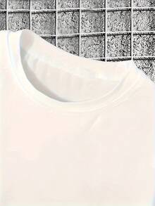 Camiseta de Estilo Graffiti Motivacional para Niños "Construido Diferente" - Naranja Vibrante con Letras Azules/Moradas, Camiseta de Verano de Manga Corta con Cuello Redondo Casual para Adolescentes, Gimnasio y Atuendo Casual, Lavable a Máquina, Declaración de Moda Juvenil, Estampado de Graffiti, Ajuste Regular, Tela Cómoda y Transpirable para Ropa Casual de Niños, Ideal para Atuendos de Verano, Diseño Audaz con Letras de Graffiti - Blanco - Ver 5