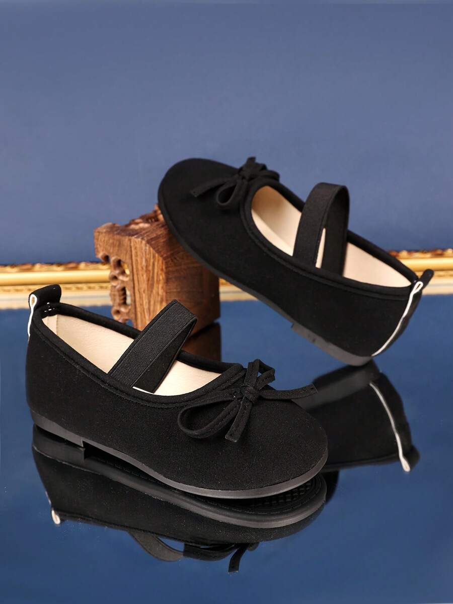 1 Đôi giày bệt đen kiểu slip-on cho bé gái lớn, chất liệu da lộn PU, trang trí nơ, mũi tròn, đế mềm, thoải mái, giày công chúa thường ngày phù hợp cho bé từ 1-12 tuổi, đi chơi, dự tiệc, du lịch, trong nhà/ngoài trời, hàng mới về mùa xuân/thu 2026. - màu đen - Xem 1