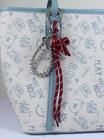 Charme de sac avec chaîne de perles d'argent et nœud rouge Ankela, pendentif de porte-clés de voiture, pendentif de sac artisanal en corde tressée, cadeau de luxe pour femmes et filles