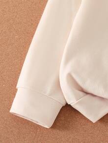 年轻女孩撞色拼接花卉图案卫衣搭配喇叭裤休闲装 - 杏色 - 查看 3