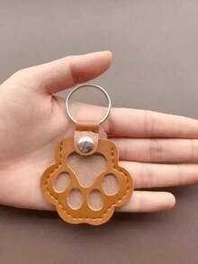 用于存放丢失的宠物毛发的吊坠、用于猫狗的纪念袋、用于存放家人朋友的猫狗毛发的袋子以及带有吊饰的宠物毛发袋