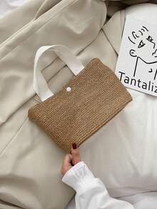 大号黑色波西米亚风编织手提包，适合海滩、露营和户外活动，采用耐用面料制成，磁扣闭合，是女性冒险、海滩旅行和波西米亚风格穿搭的理想之选。