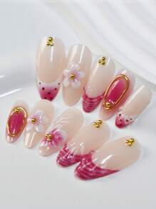 Una caja de 24 uñas medianas de almendra, con flores 3D rosas y detalles degradados en oro rosa, exudando un ambiente dulce y elegante. Conjunto de uñas postizas con lima de uñas y pegamento de gelatina, perfecto para todas las mujeres, ideal para uso diario, fiestas y ocasiones especiales, agregando un toque de suave a tus dedos.