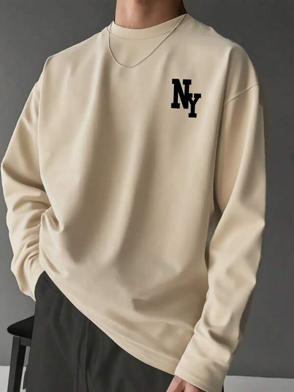 Prenda versátil para otoño | Camiseta de manga larga con cuello redondo y estampado del elemento de Nueva York en color albaricoque, adecuada como regalo para esposo, novio o amigo