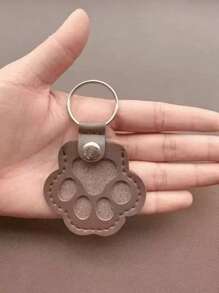 用于存放丢失的宠物毛发的吊坠、用于猫狗的纪念袋、用于存放家人朋友的猫狗毛发的袋子以及带有吊饰的宠物毛发袋