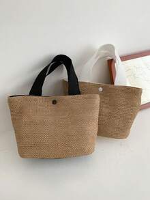 大号黑色波西米亚风编织手提包，适合海滩、露营和户外活动，采用耐用面料制成，磁扣闭合，是女性冒险、海滩旅行和波西米亚风格穿搭的理想之选。