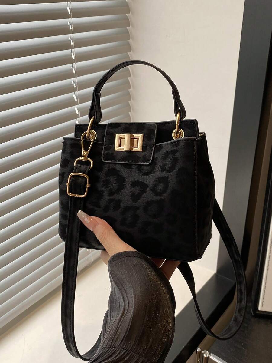 新款时尚休闲可锁手提包，适合聚会、郊游、购物和日常使用，可存放硬币、手机，也适合作为白领、大学生和办公室职员的工作包，优雅的女士包