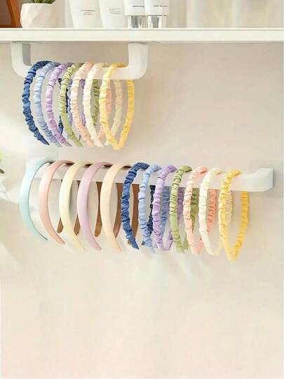 1个节省空间的壁挂式首饰收纳架 - 多功能塑料发饰收纳架，轻松打造整洁家居，时尚现代设计，易于安装的非防水收纳架，是圣诞节和新年送礼的理想之选，也是整理空间的完美方案。这款实用又时尚的壁挂式挂钩，无需钻孔即可快速安装，用这款必备的发带和发饰收纳架提升您的生活空间，是情人节惊喜和感恩节准备的完美之选，兼具实用性和时尚感，提升您的家居装饰。