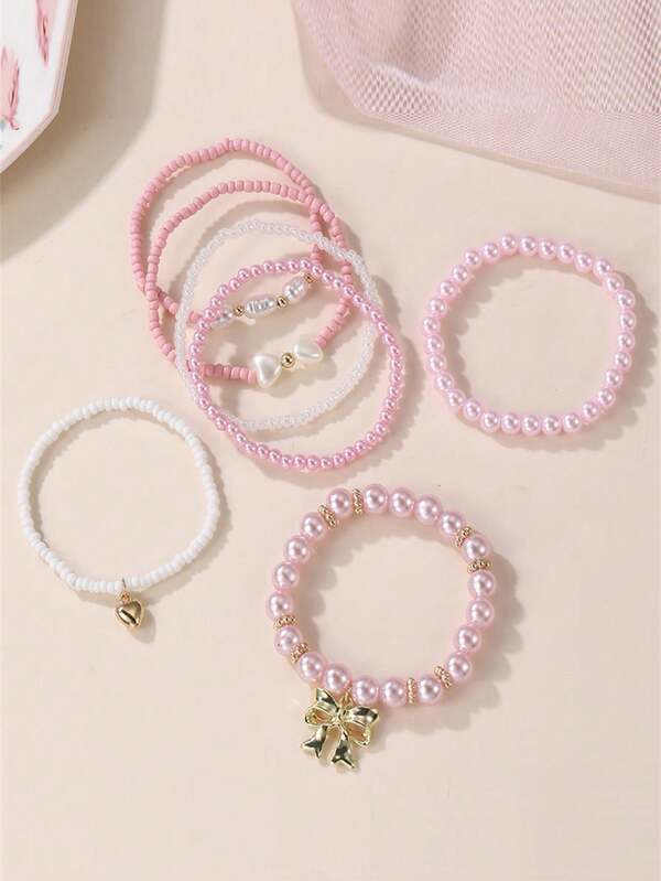 Set de 7 piezas de pulseras con lazos, corazones y perlas falsas para niñas, adecuado para uso diario, fiestas, reuniones y regalos de cumpleaños