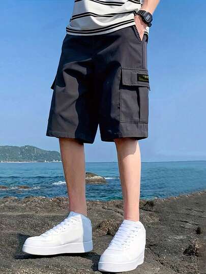 1入男童休閒運動户外口袋時尚英文字母熱移印補丁工裝短褲，春秋季