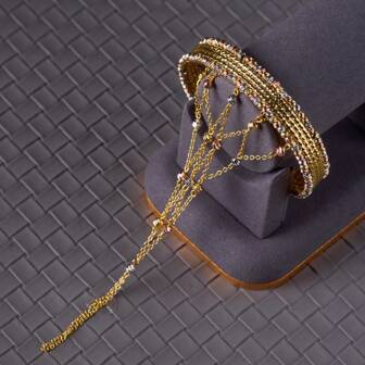 Italienskt tillverkat 3-raders fasetterat kopparringarmband med kombination av 3-färgade kopparpärlor och öppet armband i mesh, lämpligt för kvinnors vardagsbruk