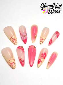 10 unghii tip stiletto, lucrate manual, cu bază în gradient de roz nud și roz. Sunt pictate cu buline roșii și modele de stele, decorate cu flori mici tridimensionale și asortate cu nituri minuscule aurii. Proaspete, dar jucăușe, sunt potrivite pentru zi cu zi și atrăgătoare. Fiecare set conține 10 unghii, cu trei dimensiuni disponibile pentru selecție și un set de unelte inclus. Este o alegere ideală pentru femei și fete!