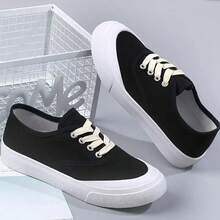 Zapatillas de lona para mujer Zapatillas de lona de color liso: novedades de temporada Zapatillas de lona sin cordones, transpirables, modernas y versátiles para estudiantes. - Negro - Ver 2