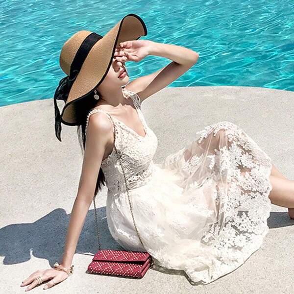 Chapeau de paille d'été pour femmes, chapeau de soleil à large bord pour la protection, chapeau pliable à large bord de style coréen, accessoire polyvalent de plage avec décoration de nœud