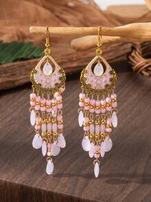 一对波西米亚复古风耳环，饰有雕刻图案和油滴状细节，泪滴形流苏由串珠制成。适合女性在节日和庆典期间佩戴。 - 紅色 - 查看 9