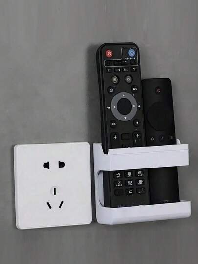 2/4个装磁性遥控器收纳架，壁挂式，免钻孔自粘收纳，适用于电视和空调遥控器，安装简便，黑色，椭圆形设计，牢固吸附，家用遥控器整理架