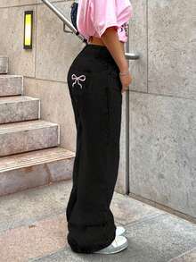 Quần jeans nữ ống đứng màu sáng cổ điển với túi sau thêu họa tiết, thích hợp mặc hàng ngày, màu đen mùa xuân. - màu đen - Xem 6