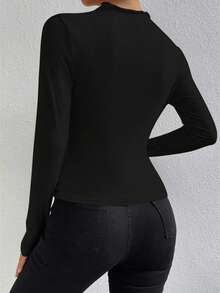 Maglia a maniche lunghe in maglia nera da donna, con dettagli plissettati, collo alto, vestibilità regular, tessuto in maglia da 120g