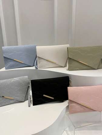 Bolso de embrague largo minimalista de la versión coreana para mujeres 2025, textura de arena fluida casual