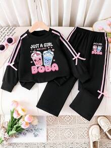 Set di felpa girocollo e pantaloni della tuta con stampa di cartoni animati per ragazze pre-adolescenti - nero - Visualizzare 1