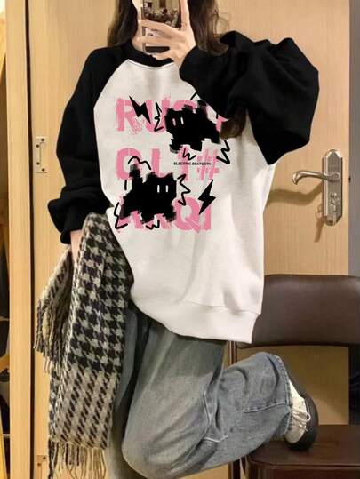 1 件女孩街头卡通闪电印花插肩袖卫衣，柔软舒适，春秋日常休闲装