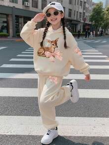 Conjunto de sudadera con cuello redondo y leggings con estampado de dibujos animados para niña preadolescente