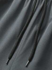 1条男士时尚户外运动裤，独特侧边印花装饰，实用拉链口袋，舒适弹力设计，支持动态运动。适合户外活动、旅行、健身、日常穿着、外出、居家和外出就餐。 - 灰色 - 查看 5