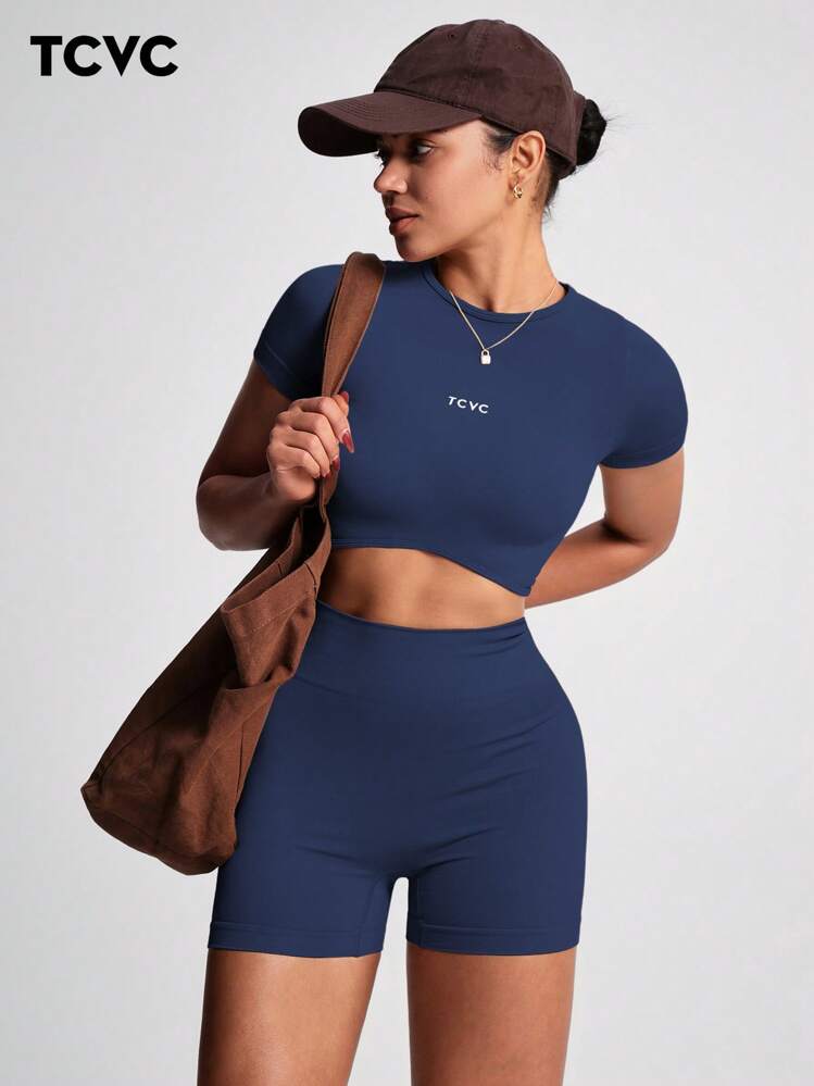 TCVC Ensemble de vêtements de sport pour femmes, Top à manches courtes col rond sans couture et élastique, short de cyclisme taille haute avec contrôle du ventre, ajustement serré. Tenue de yoga